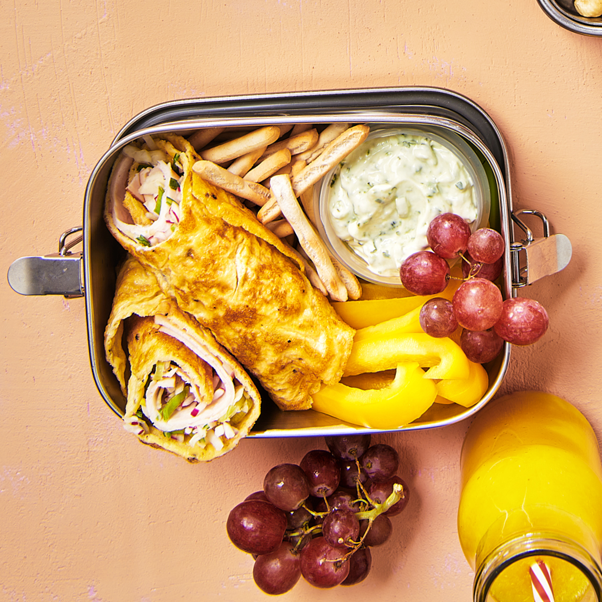 Lunchbox met eiwrap, Heks’n’kaas en druiven