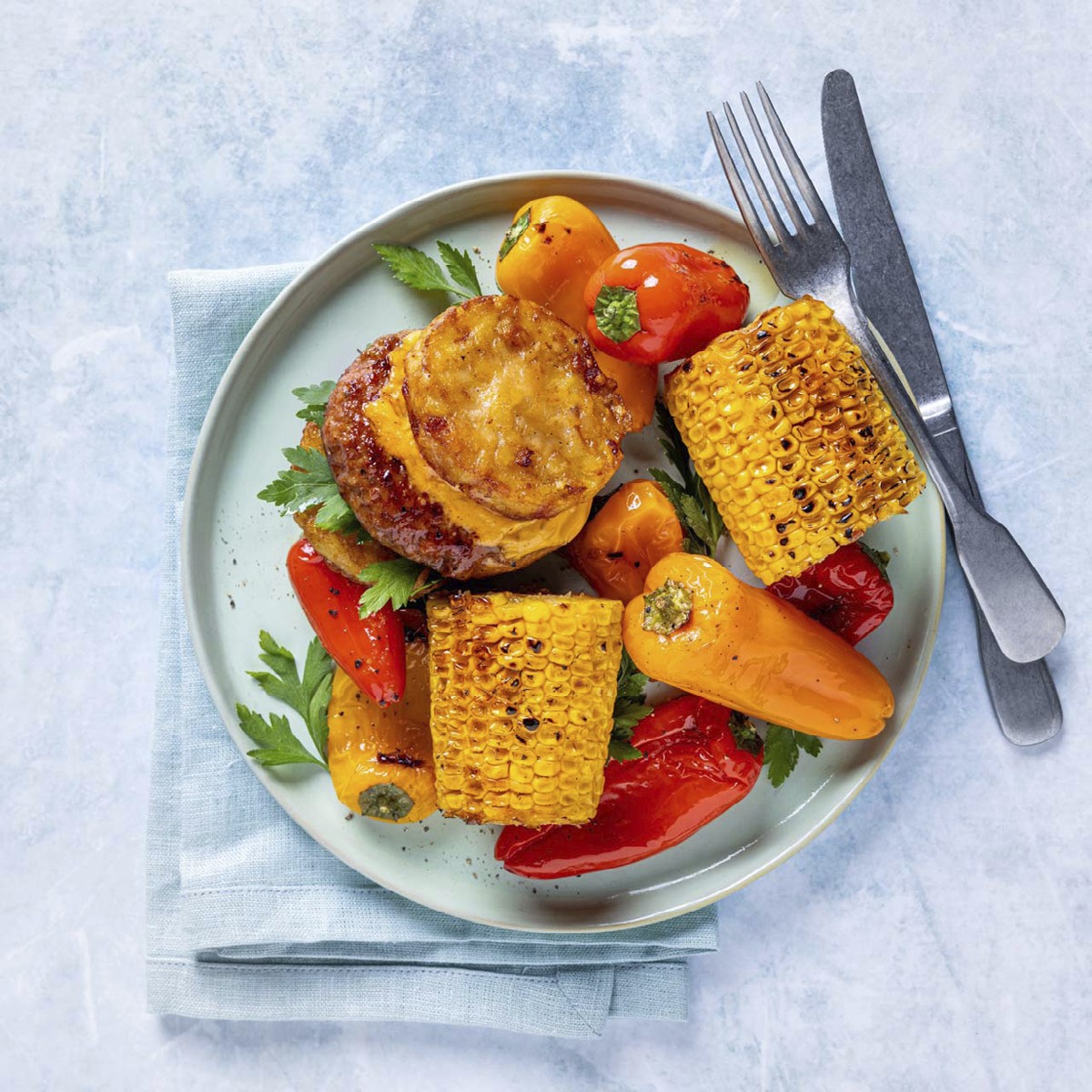 Rösti hamburger met geroosterde maïs