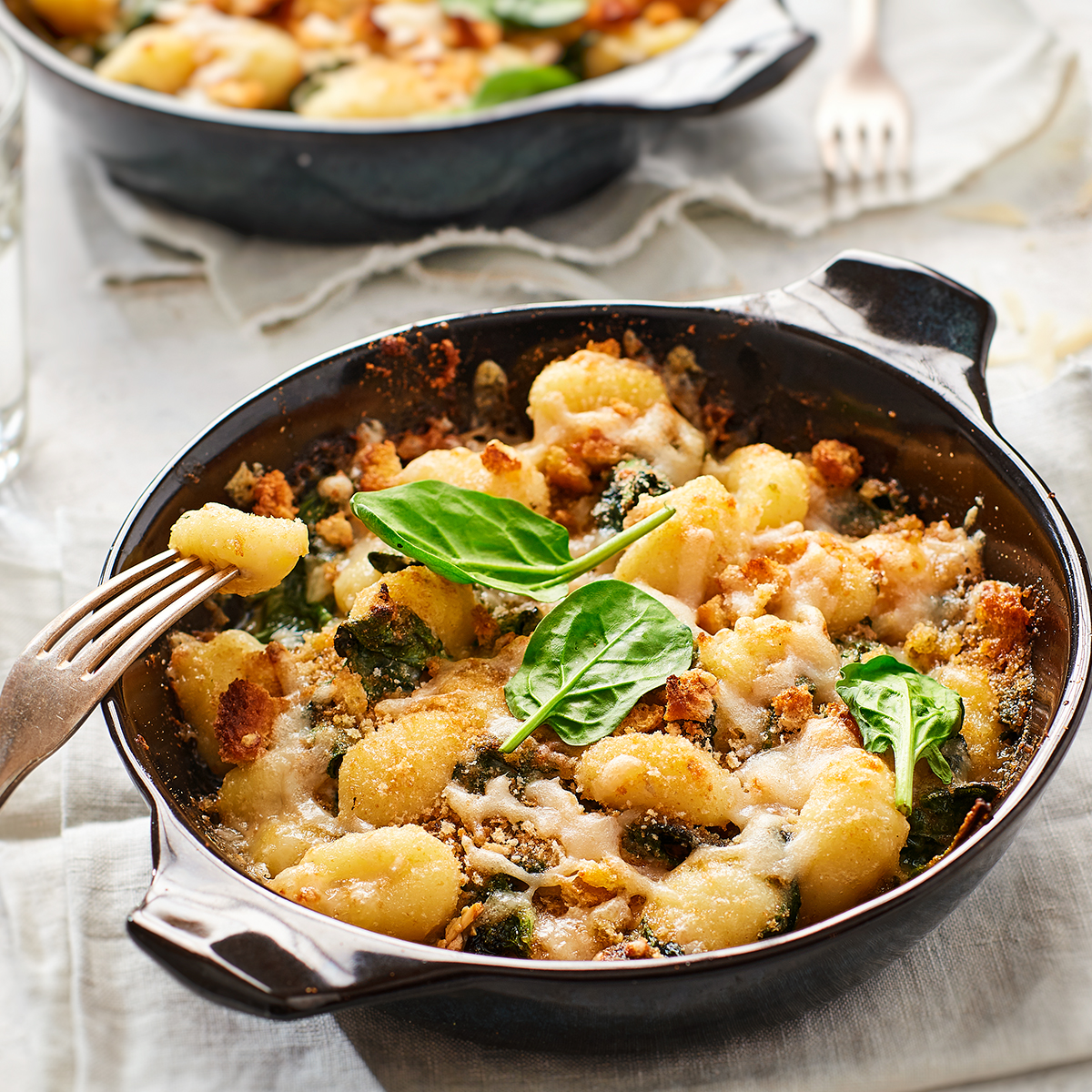 Gegratineerde gnocchi met spinazie en gorgonzola